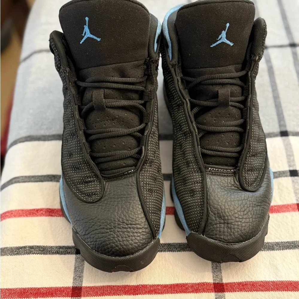 Jordan 13s in Black and Light Blue‎